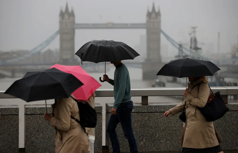 Commuters walk across London Bridge toward the financial district, in London, Britain, September 26, 2022.  REUTERS/Peter Nicholls