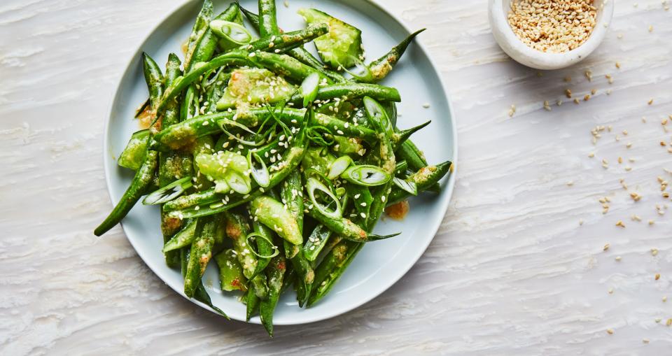 Crushing and smashing green beans and cucumbers sounds crazy, but it creates nooks and crannies to soak up as much umami-rich miso sauce as possible. And this is a dressing you'll want a lot of. <a rel="nofollow noopener" href="https://www.bonappetit.com/recipe/green-beans-and-cucumbers-with-miso-dressing?mbid=synd_yahoo_rss" target="_blank" data-ylk="slk:See recipe.;elm:context_link;itc:0;sec:content-canvas" class="link ">See recipe.</a>