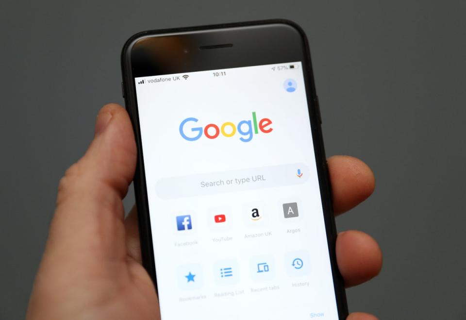 A person holds an iPhone showing the app for Google chrome search engine. Picture date: Friday January 3, 2020 (Andrew Matthews/PA) (PA Archive)