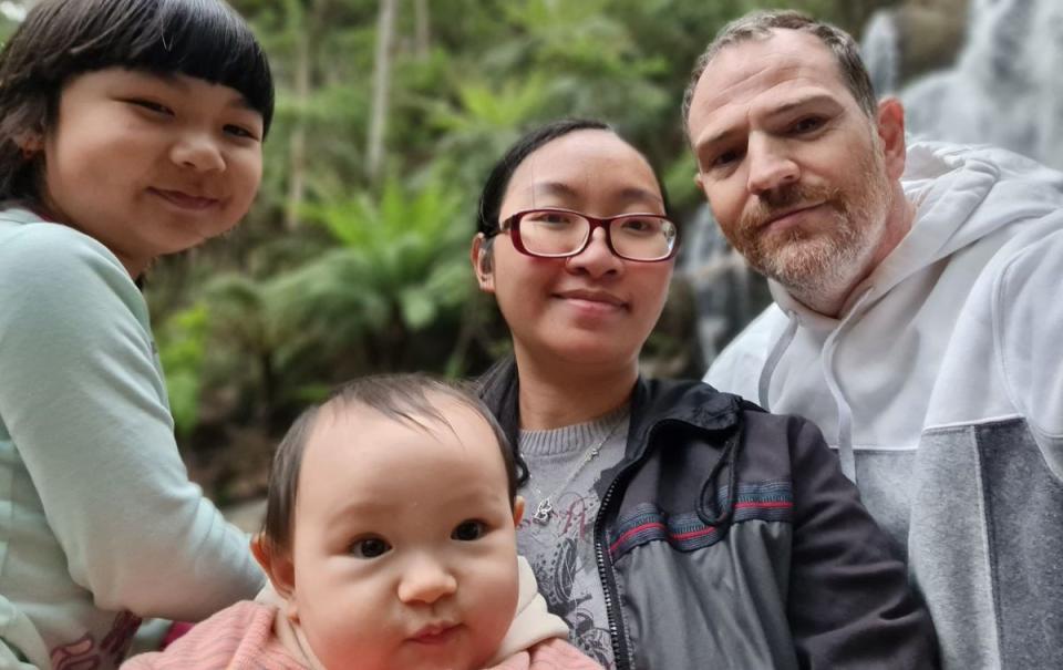 A photo of Aarron Ralston with his wife and two daughters