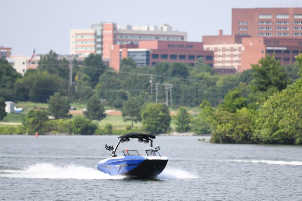 A boat rides down the Tennessee River at Sequoyah Hills Park, Friday, June 30, 2023. 