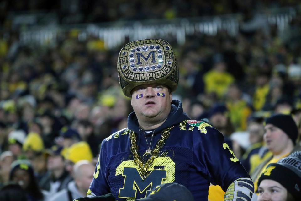 A Michigan fan watches the action against Purdue during the second half of Michigan's 41-13 win on Saturday, Nov 4, 2023, in Ann Arbor.