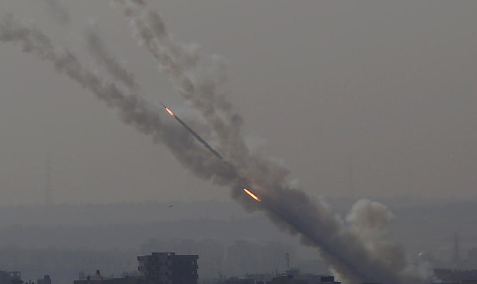 Rockets are launched from Gaza Strip to Israel, Tuesday, Nov. 12, 2019. Israel killed a senior Islamic Jihad commander in Gaza early Tuesday in a resumption of pinpointed targeting that threatens a fierce round of cross-border violence with Palestinian militants. (AP Photo/Hatem Moussa)