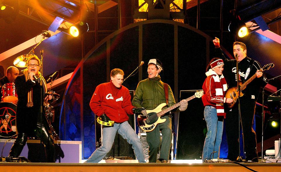 Canadian ice skaters David Pelletier and Jamie Sale perform with Barenaked Ladies at the Medals Plaza on February 13, 2002. | Laura Seitz, Deseret News