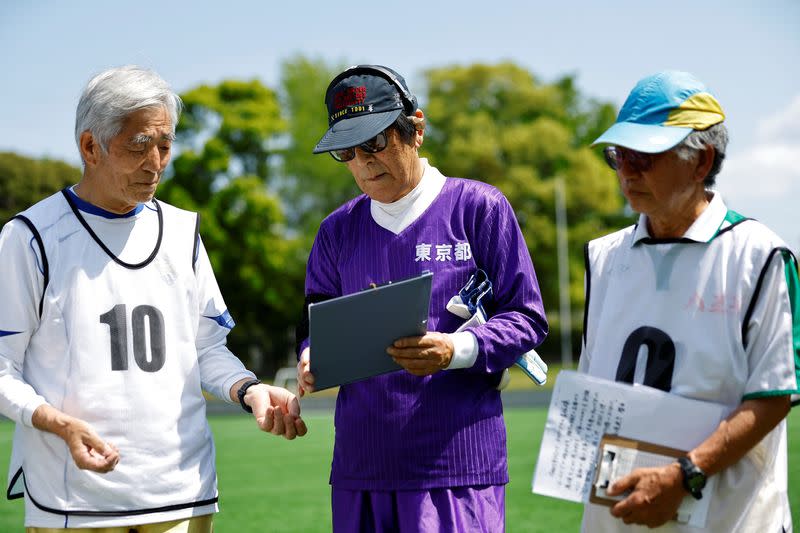 FILE PHOTO: The Wider Image: For Japan's ageing soccer players, 80 is the new 50