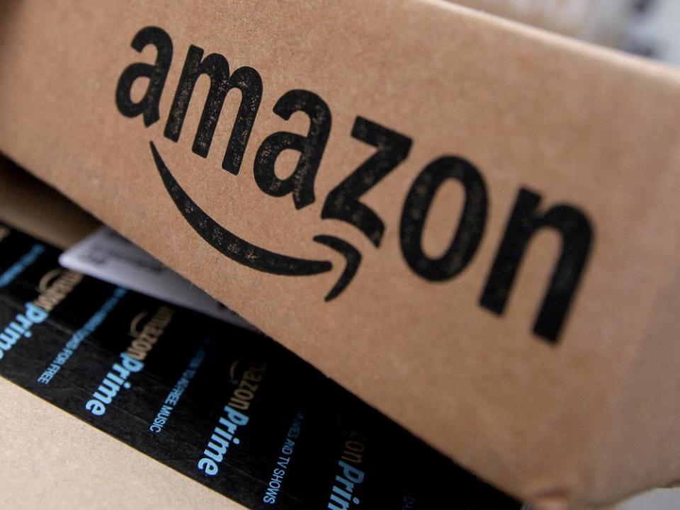 FILE PHOTO: Amazon boxes are seen stacked for delivery in the Manhattan borough of New York City