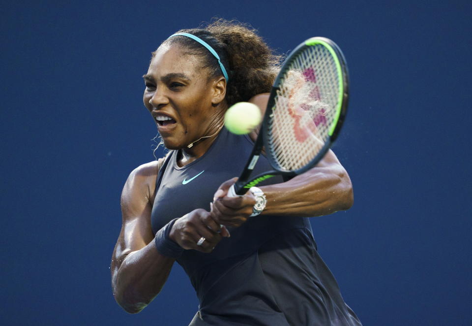 Serena Williams, of the United States, returns a shot to Elise Mertens, of Belgium, during the Rogers Cup women’s tennis tournament Wednesday, Aug. 7, 2019, in Toronto. (Mark Blinch/The Canadian Press via AP)
