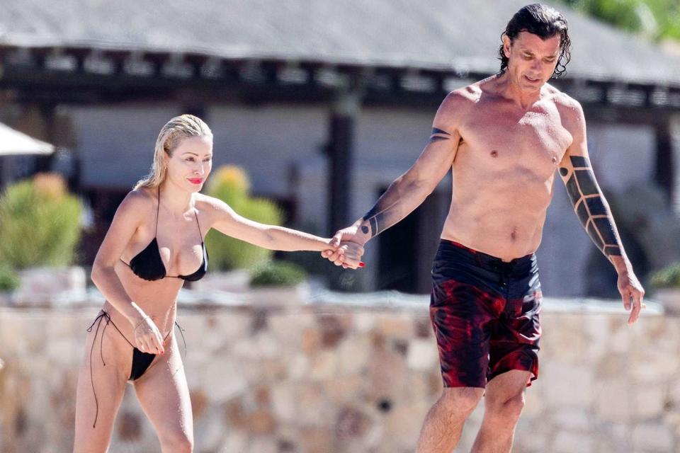 <p>HEM / BACKGRID</p> Gavin Rossdale and Xhoana X hold hands in Cabo in May 2024