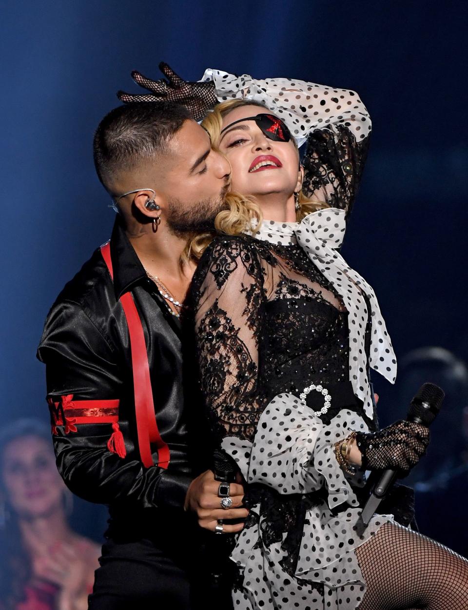 While performing her hit song, Medellin, Madonna shares a sensual moment with Madula on stage. 