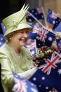 <p>The large crowd waving Australian flags greeted Queen Elizabeth after a Commonwealth Day Service. At the time, she and her husband were on a five-day long trip to Australia where she opened up the Commonwealth Games in Melbourne.</p>