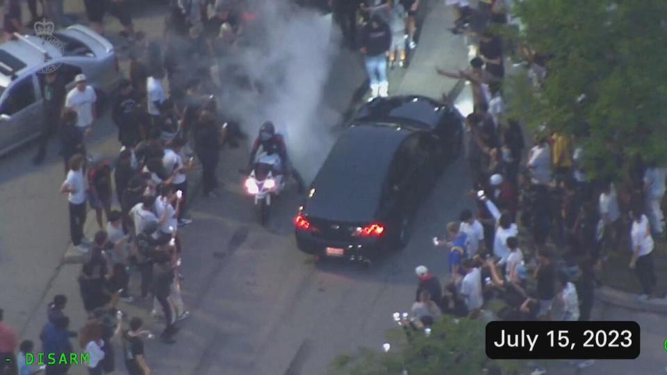 A screenshot taken from video captured by the York Regional Police aerial unit of an illegal car rally in July 2023. (@OfficialYRP/YouTube - image credit)