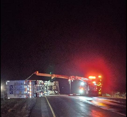 Storms that blew across Indiana late Friday, March, 31, 2023, caused widespread damage. Indiana State Police from the Lafayette Post were dispatched to Interstate 65 near the 153 mile marker where this semi was blown onto its side. No one was injured, according to police.