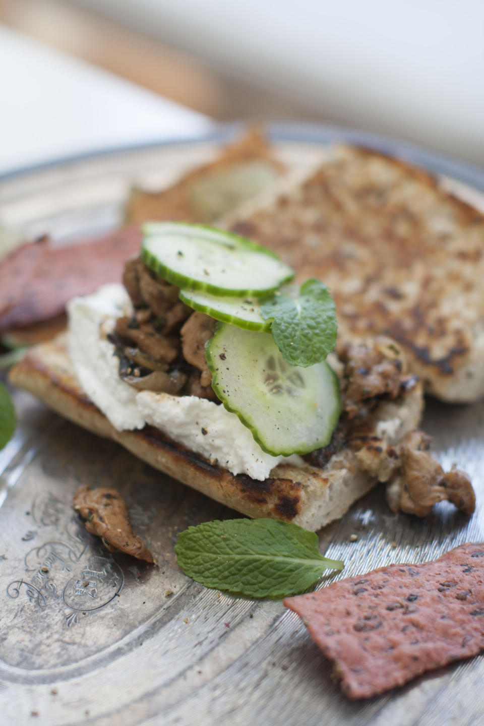 This March 24, 2014 photo shows minted lemon and olive chicken wraps in Concord, N.H. (AP Photo/Matthew Mead)