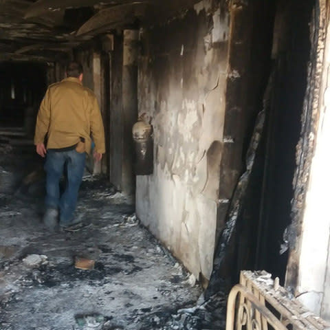 A burned corridor of the Intercontinental Hotel a day after the attack in Kabul - Credit: REUTERS