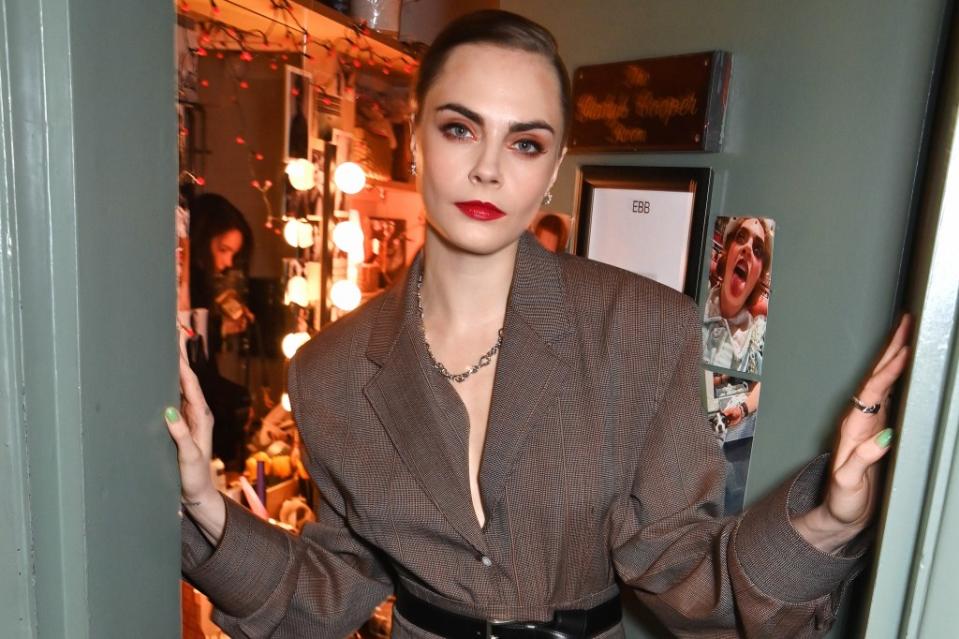 Supermodel Cara Delevingne carried an alto part to a Gaia choir event — after she signed up under the fake name “June.” Dave Benett/Getty Images