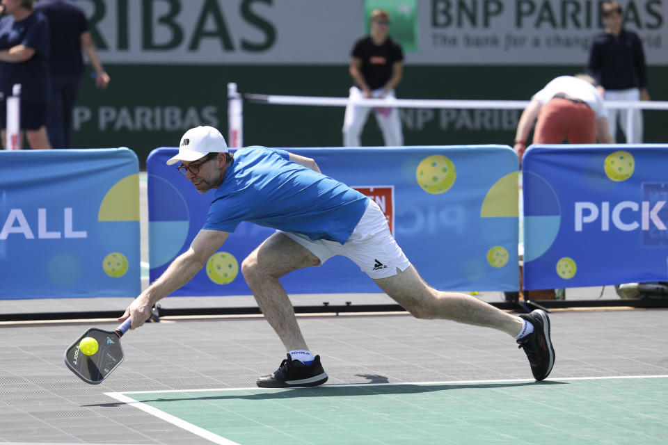 People play pickleball at the French Open tennis tournament at the Roland Garros stadium in Paris, Thursday, June 6, 2024. (AP Photo/Aurelien Morissard)