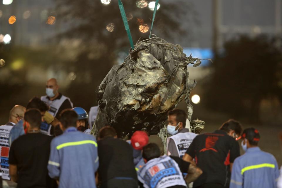 <p>Wreckage from the Haas driver’s car is removed</p>POOL/AFP via Getty Images