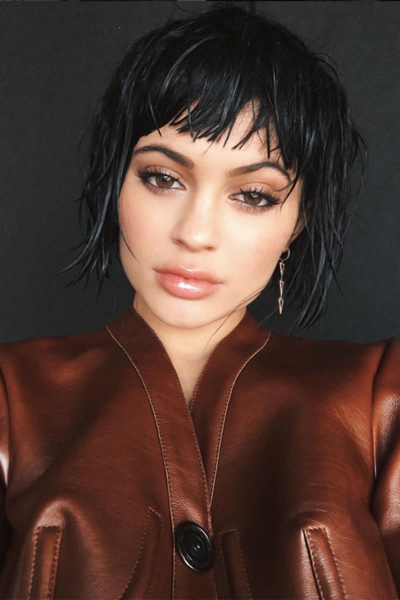 <p>A short and choppy wet haircut (thanks to a wig) on the set of a photoshoot in 2016.</p>