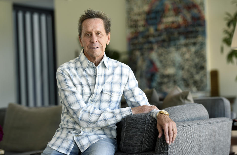 This Aug. 30, 2019 photo shows producer Brian Grazer posing for a portrait at his home in Santa Monica, Calif., to promote his book "Face to Face: The Art of Human Connection." (Photo by Chris Pizzello/Invision/AP)