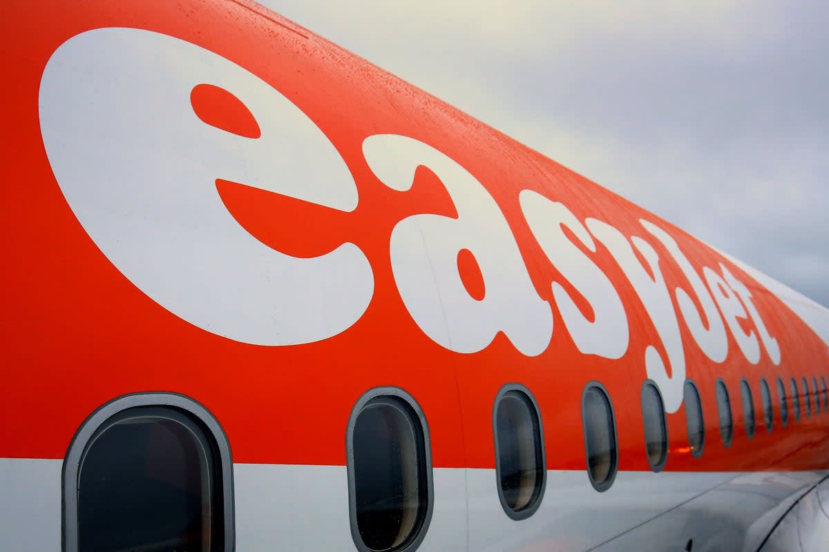 Budget airline easyJet has hiked its full-year profit outlook after trimming losses in its first quarter and cheering a record surge in bookings since the start of the year (Gareth Fuller/PA) (PA Archive)