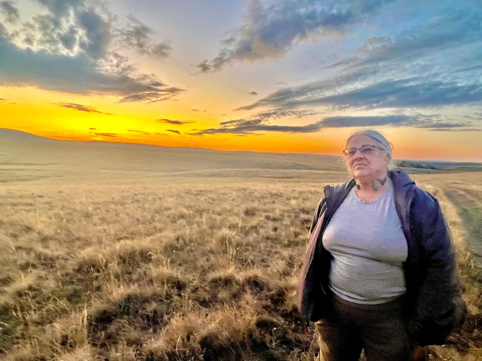 Normandy Helmer, a retired University of Oregon librarian, enjoys painting different parts of the Zumwalt Prairie landscape.