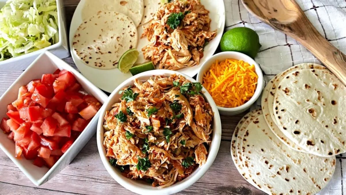 <p>Krista Marshall</p><p>With only three main ingredients and your Crock Pot, your Cinco de Mayo dinner just got a lot easier.</p><p><strong>Get the recipe: <a href="https://parade.com/recipes/salsa-chicken-crockpot" rel="nofollow noopener" target="_blank" data-ylk="slk:Crock Pot Salsa Chicken;elm:context_link;itc:0;sec:content-canvas" class="link rapid-noclick-resp">Crock Pot Salsa Chicken</a></strong></p>