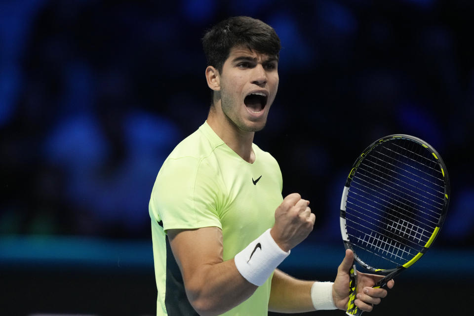 Spain's Carlos Alcaraz reacts during the singles tennis match against Russia's Andrej Rublev, of the ATP World Tour Finals at the Pala Alpitour, in Turin, Italy, Wednesday, Nov. 15, 2023. (AP Photo/Antonio Calanni)