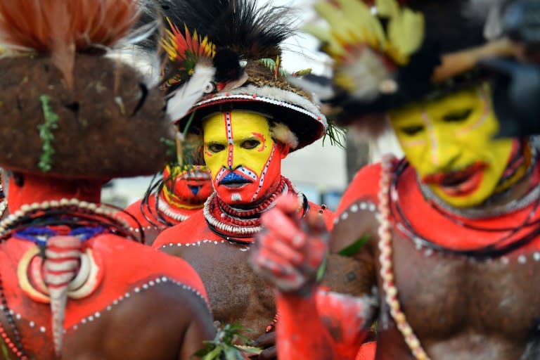 The Chinese leader was greeted on the tarmac by tribesmen and women in traditional attire, complete with feather headdresses