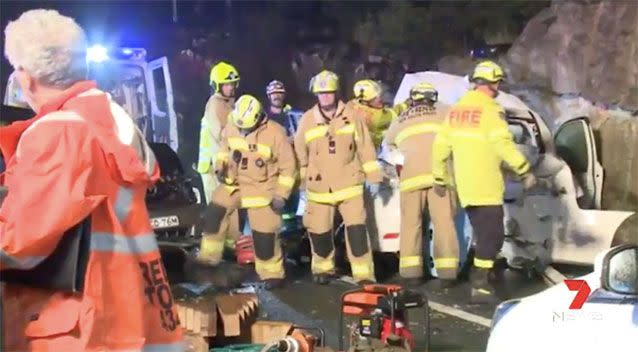 Emergency crews work at the scene of the crash Source: 7 News