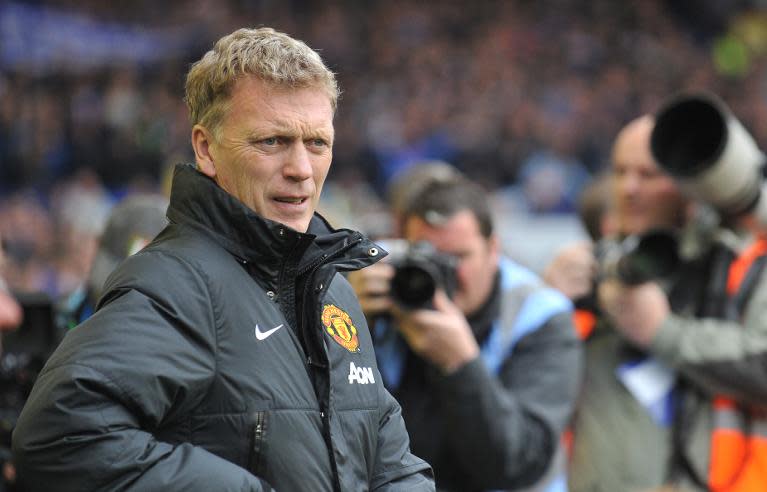 Former Manchester United manager David Moyes watches a Premier League match between Everton and Manchester United at Goodison Park in Liverpool on April 20, 2014