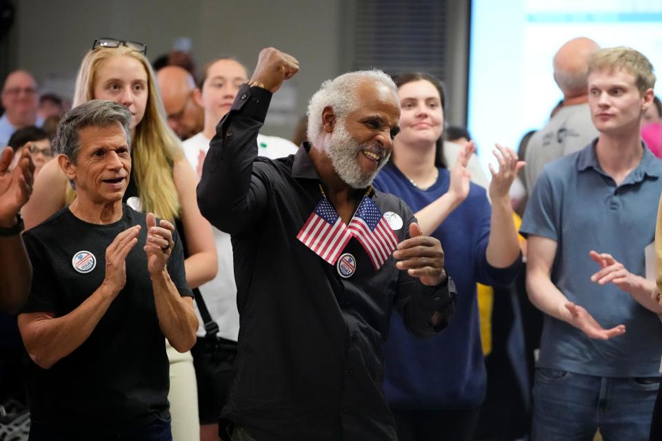 Aug 8, 2023; Columbus, Ohio, USA;  Bryan Phipps of the South Side of the South Side celebrates the defeat of Issue 1 wiht a fist pump during an election night party at the Columbus Fire Fighters Local 67. 