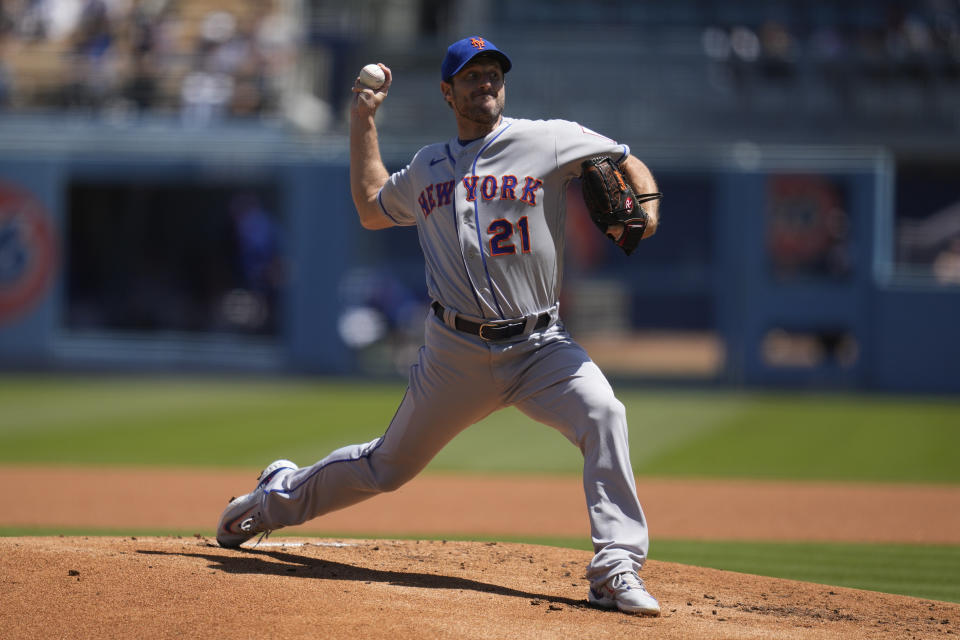 New York Mets starting pitcher Max Scherzer (21) throws during the first inning of a baseball game against the Los Angeles Dodgers in Los Angeles, Wednesday, April 19, 2023. (AP Photo/Ashley Landis)