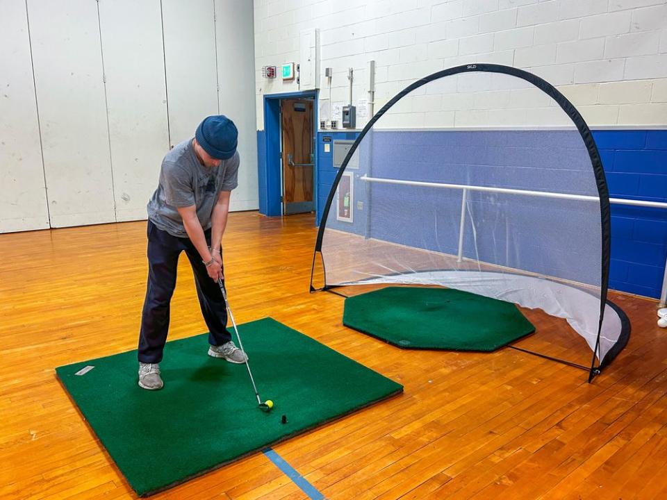 a man playing a game of golf