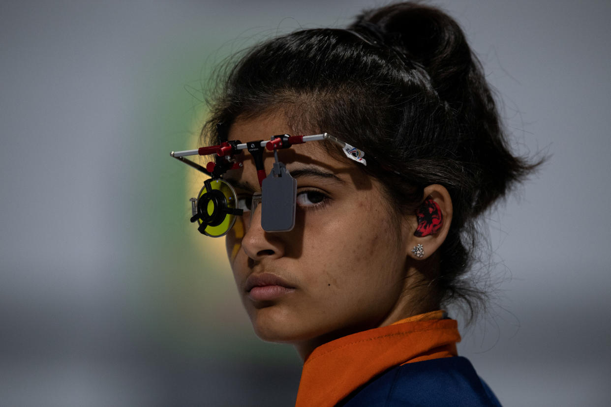 Manu Bhaker of India competes in the Shooting 10m Air Pistol Mixed International Team Quarter-final at the Shooting Range, Tecnopolis Park, Buenos Aires, Argentina, October 12, 2018. Lukas Schulze for OIS/IOC/Handout via REUTERS ATTENTION EDITORS - THIS IMAGE HAS BEEN SUPPLIED BY A THIRD PARTY.