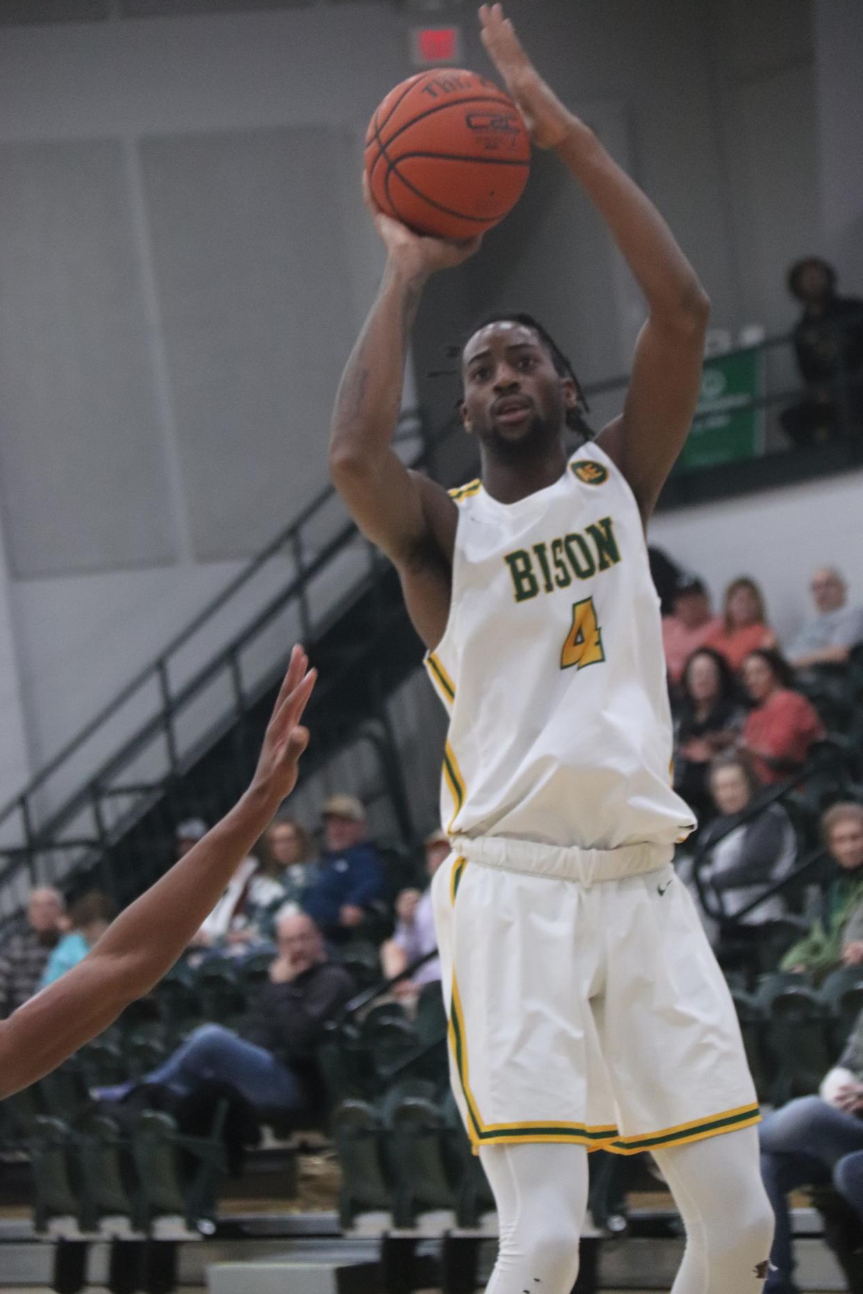 Oklahoma Baptist's Nigel Wilcox (4) puts up a shot against Ouachita Baptist on Thursday.