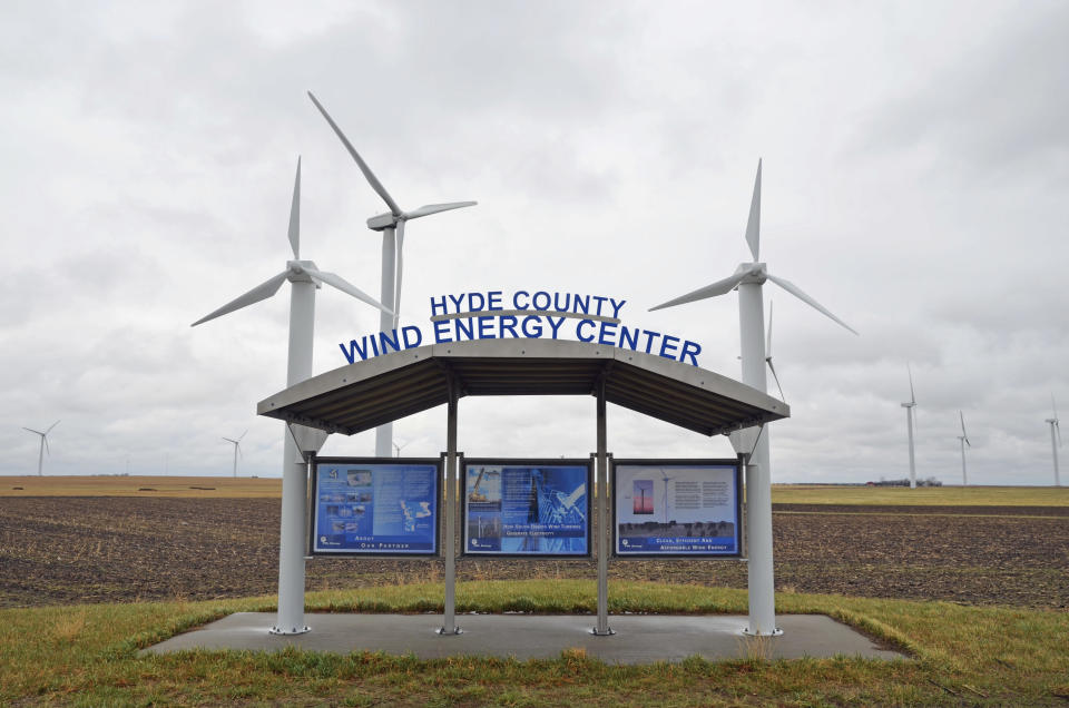 The South Dakota Wind Energy Center is seen Tuesday, April 29, 2014, near Highmore, S.D., where a single-engine Piper crashed in foggy weather Sunday evening after it apparently hit the blade of the one of the wind turbines. The pilot and three cattlemen returning from a sale of live cattle and embryos were killed in the crash. (AP Photo/Capital Journal, Joel Ebert)