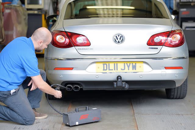 A Volkswagen Passat CC car is tested for its exhaust emissions, at a MOT (Ministry of Transport) testing station in Walthamstow north east London. PRESS ASSOCIATION Photo. Picture date: Thursday 40 September 2015. See PA story  Photo credit should read: John Stillwell/PA Wire