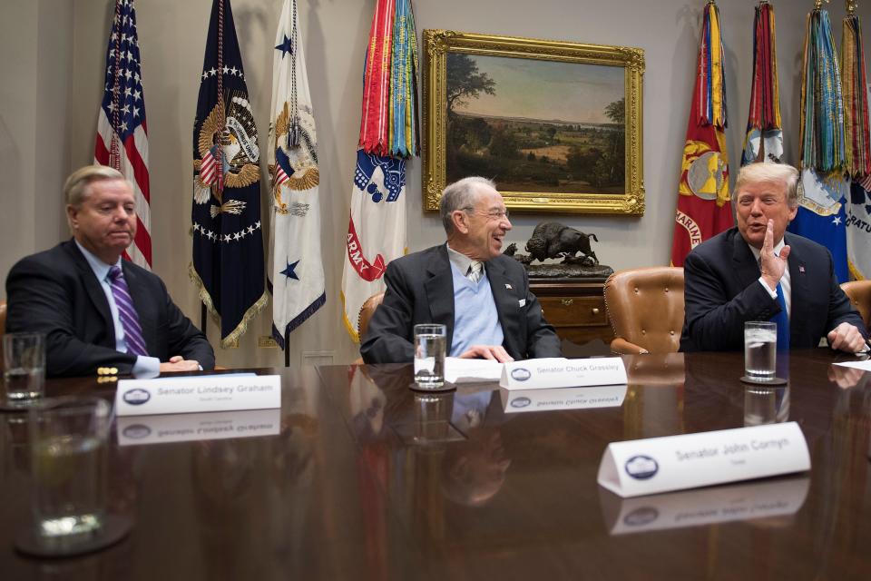 President Donald Trump jokes with Senator Chuck Grassley (R-Iowa) and Sen. Lindsey Graham (R-S.C.) during a meeting at the White House on Jan. 4. (Photo: JIM WATSON via Getty Images)