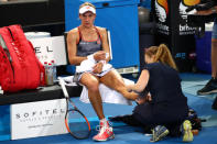 Tennis - Brisbane International - Women's Final - Pat Rafter Arena, Brisbane, Australia, January 6, 2019 Ukraine's Lesia Tsurenko receives medical attention during her match against Czech Republic's Karolina Pliskova REUTERS/Patrick Hamilton