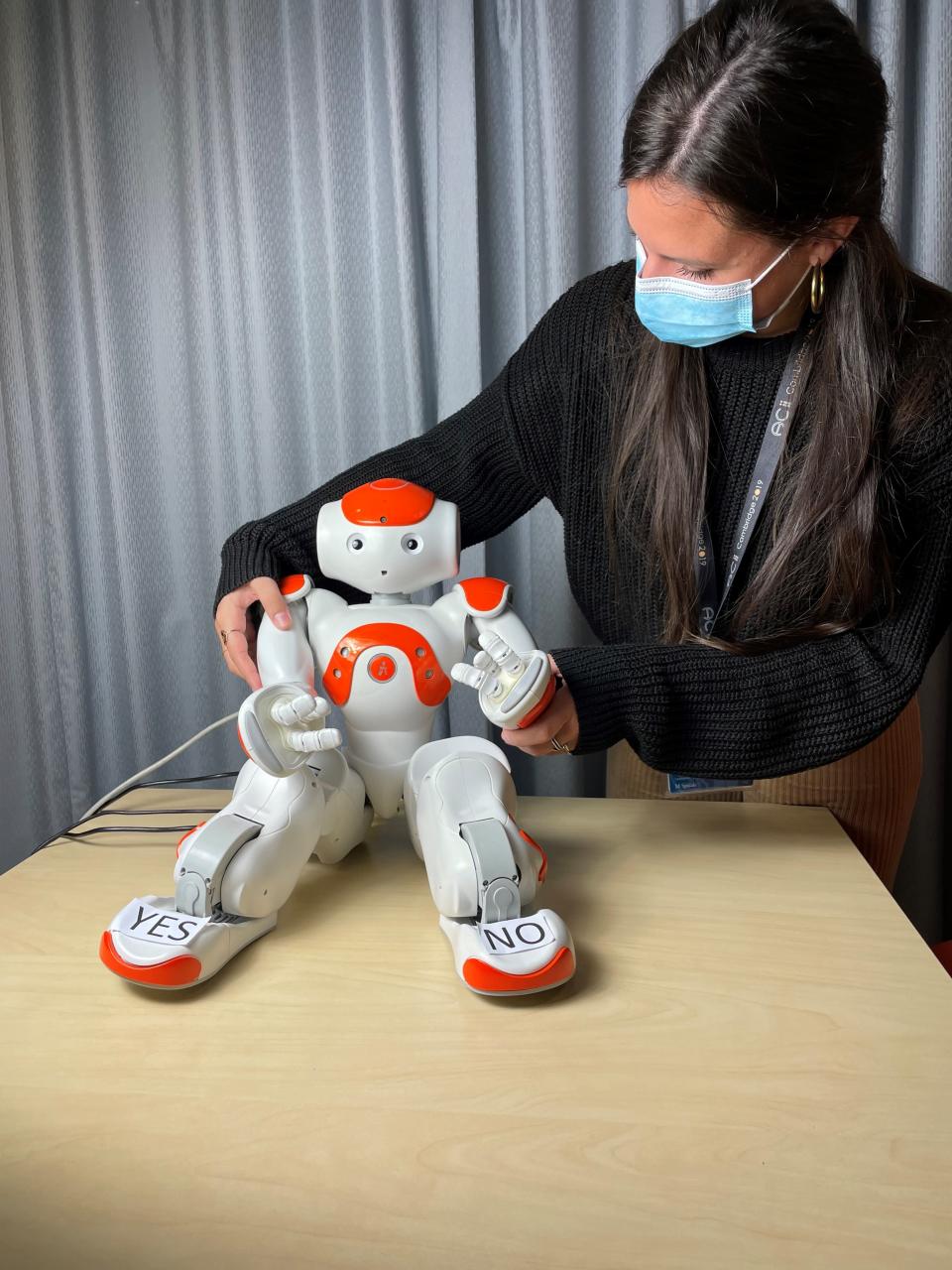 Children interacted with the robot by speaking with it, or by touching sensors on the robot’s hands and feet. (Cambridge University/ PA)