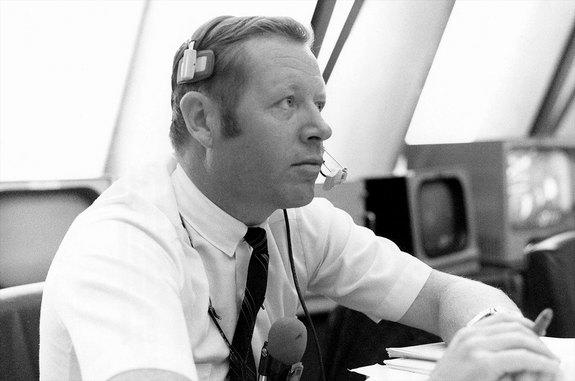 In the Firing Room of the Kennedy Space Center's Launch Control Center, Jack King's announcements keep the public up-to-date during the countdown for Apollo 12, the second lunar landing mission launched Nov. 14, 1969. With one exception (Apollo