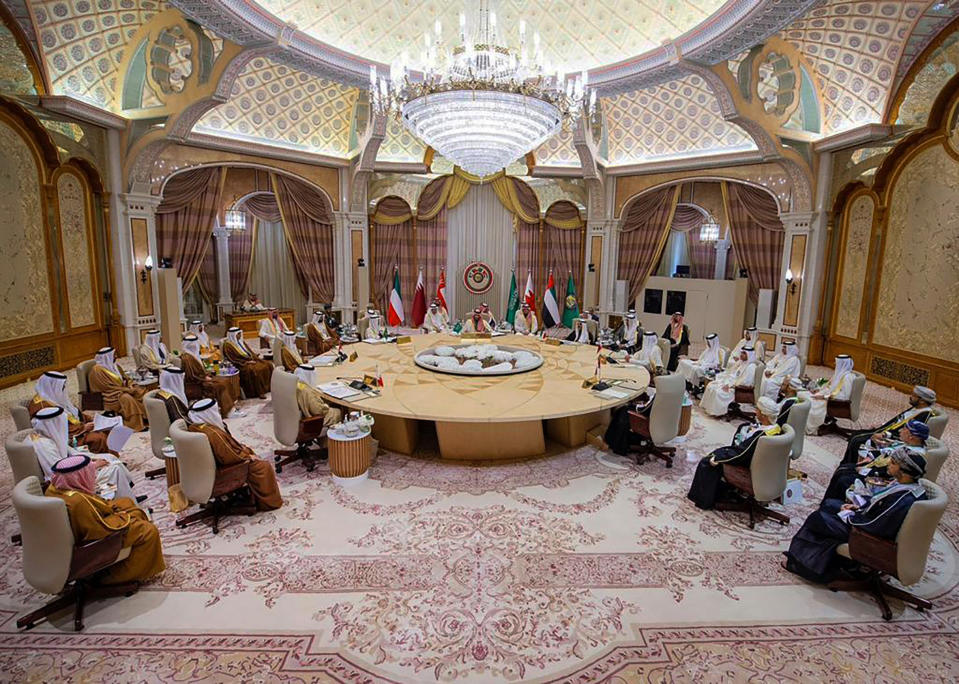 In this photo made available by Saudi Press Agency, SPA, Saudi Crown Prince and Prime Minister Mohammed bin Salman, center, talks with Gulf Arab leaders during the Gulf Cooperation Council (GCC) Summit, in Riyadh, Saudi Arabia, Friday, Dec. 9, 2022. Gulf Arab leaders and others in the Mideast met Friday in Saudi Arabia as part of a state visit by Chinese leader Xi Jinping, seeking to firm up their relations with Beijing as decades of U.S. attention on the region wanes. (Saudi Press Agency via AP)