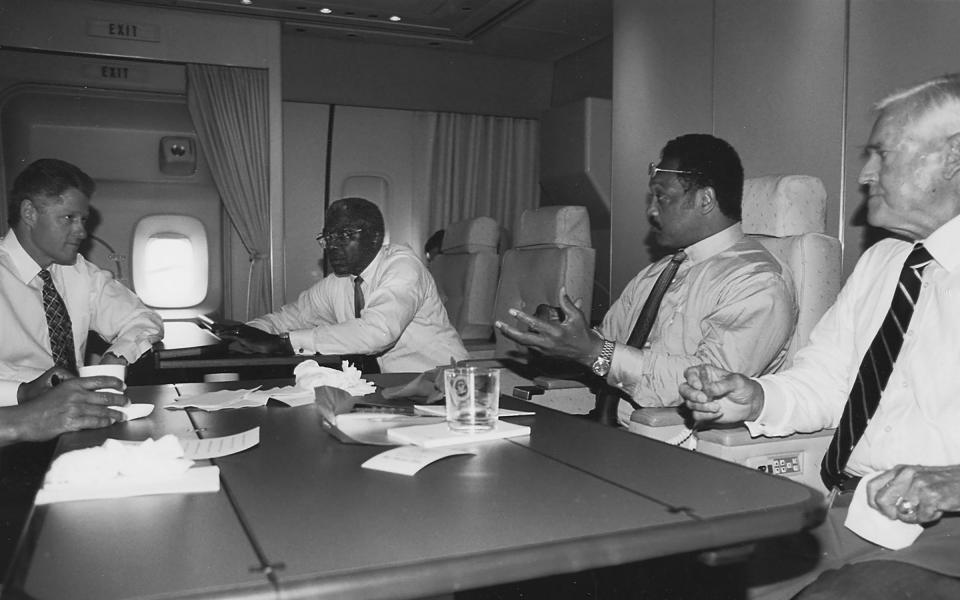Clyburn on Air Force One with President Bill Clinton, Rev. Jesse Jackson and Senator Fritz Hollings in 1996<span class="copyright">Courtesy the Office of Majority Whip James E. Clyburn</span>