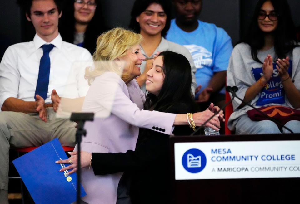 First-generation student Lilly Hernandez is hugged by first lady Jill Biden as she visits Mesa Community College to highlight how affordable community college programs are on Feb. 13, 2023, in Mesa.