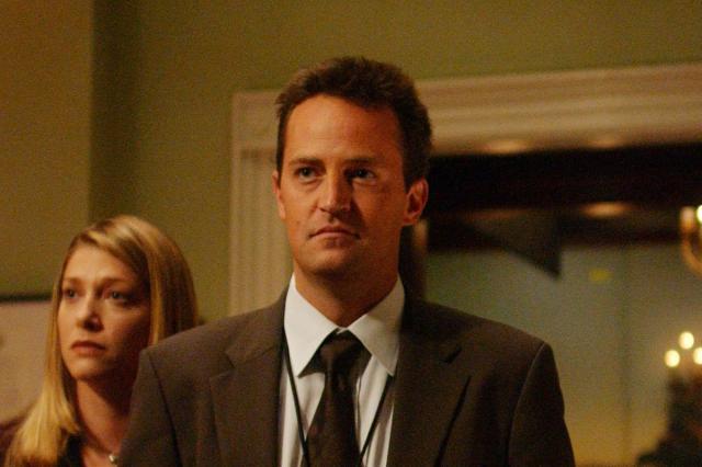 Grieving fans flock to 'Friends' New York apartment to mourn Matthew Perry