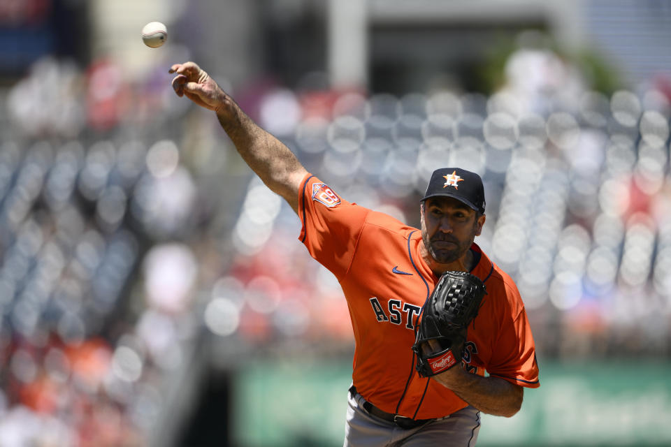 Houston Astros starting pitcher Justin Verlander delivers during the first inning of a baseball game against the Washington Nationals, Sunday, May 15, 2022, in Washington. (AP Photo/Nick Wass)