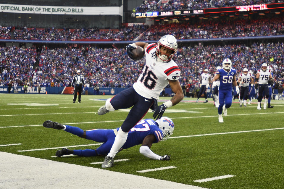 FILE - New England Patriots wide receiver Jakobi Meyers (16) coverts a fourth down against Buffalo Bills cornerback Tre'Davious White (27) during the second half of an NFL football game, Sunday, Jan. 8, 2023, in Orchard Park. Meyers has been New England’s leading producer at the position for three consecutive seasons. But he is an unrestricted free agent for the first time in his career and could command a high price on the open market. (AP Photo/Adrian Kraus, File)