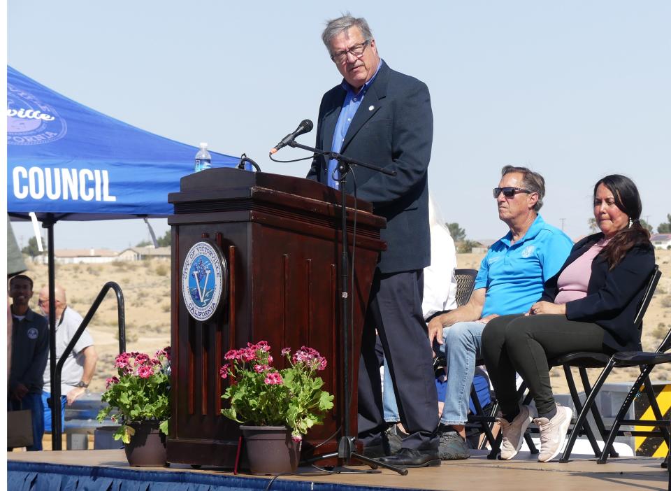 Victorville Council Members Bob Harriman and Blanca Gomez listen as Apple Valley Mayor Scott Nassif addresses the crowd
during the ribbon cutting and opening celebration of the Green Tree Extension and Bridge Project in Victorville on Saturday, May 20, 2023.