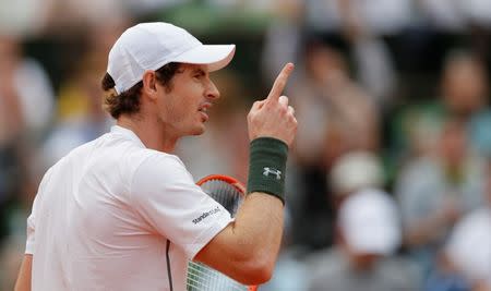 Tennis - French Open - Roland Garros - Mathias Bourgue of France v Andy Murray of Britain - Paris, France - 25/05/16. Murray reacts. REUTERS/Gonzalo Fuentes