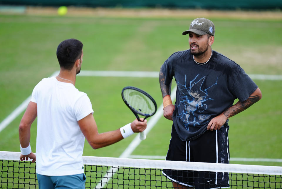 Nick Kyrgios and Novak Djokovic training at Wimbledon on day eleven of the 2024 Wimbledon Championships at the All England Lawn Tennis and Croquet Club, London. Picture date: Thursday July 11, 2024. (Photo by Mike Egerton/PA Images via Getty Images)